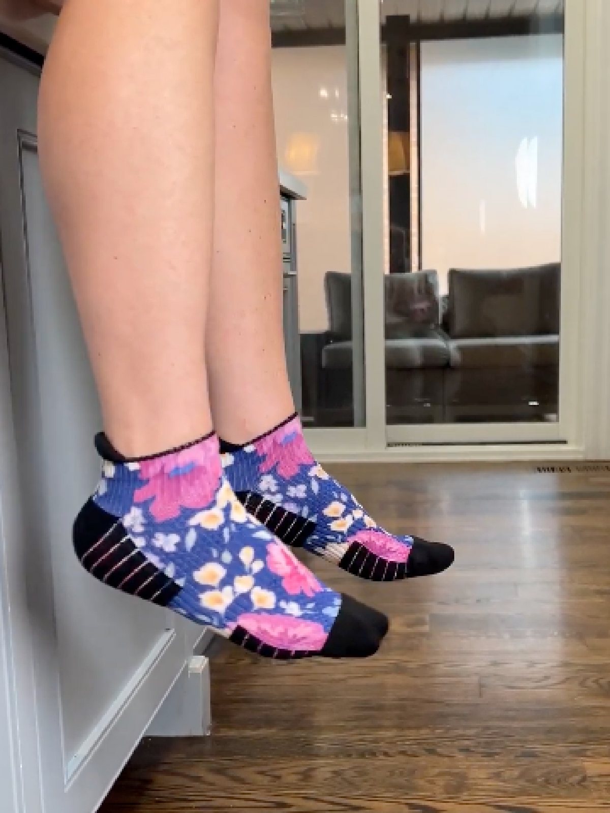Patterned Ankle Compression socks worn on both feet