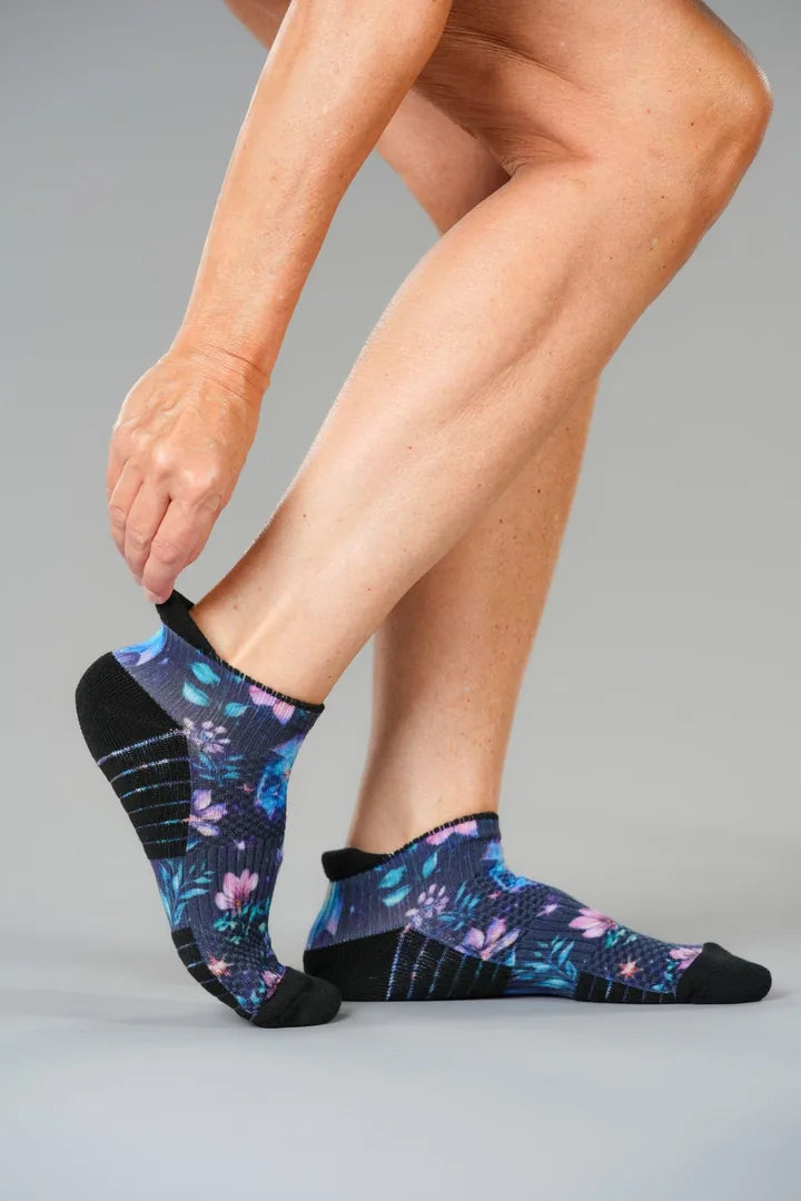 Crystals Ankle Compression socks, one hand at the heel tab